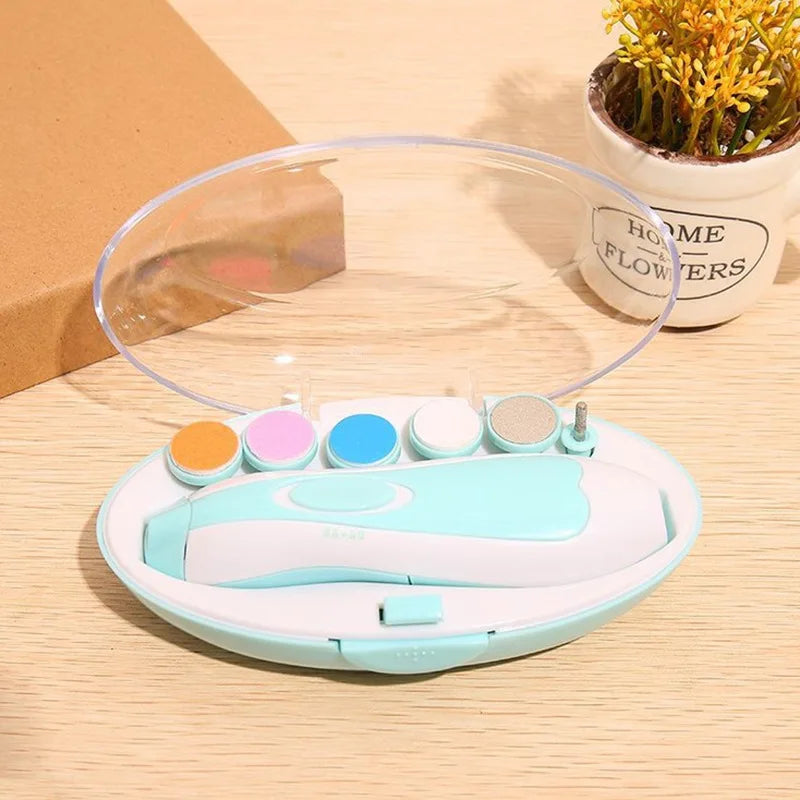 GentleGlow™ Baby Nail Trimmer kit with storage case and multiple filing pads for different age groups.