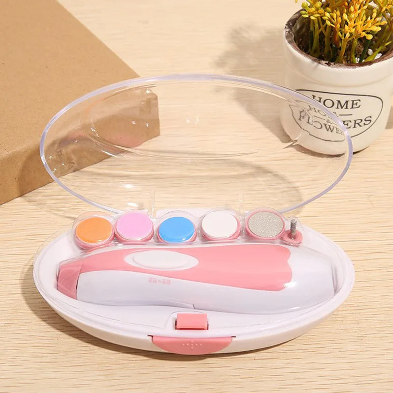 GentleGlow™ Baby Nail Trimmer electric nail file for babies with storage case and interchangeable filing heads.