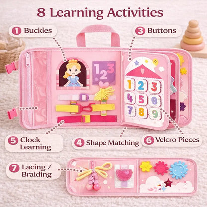 Pink luxe_aura_montessori-busy-board-backpack educational toy book with various learning activities on a soft surface.